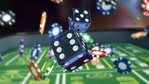 Live Sic Bo dealer table with dice shaker and three dice visible on screen at qqslot777 daftar